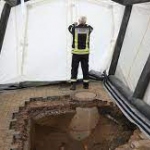 В Германии в ходе ремонта плитки на парковке обнаружили восьмиметровый туннель к банку